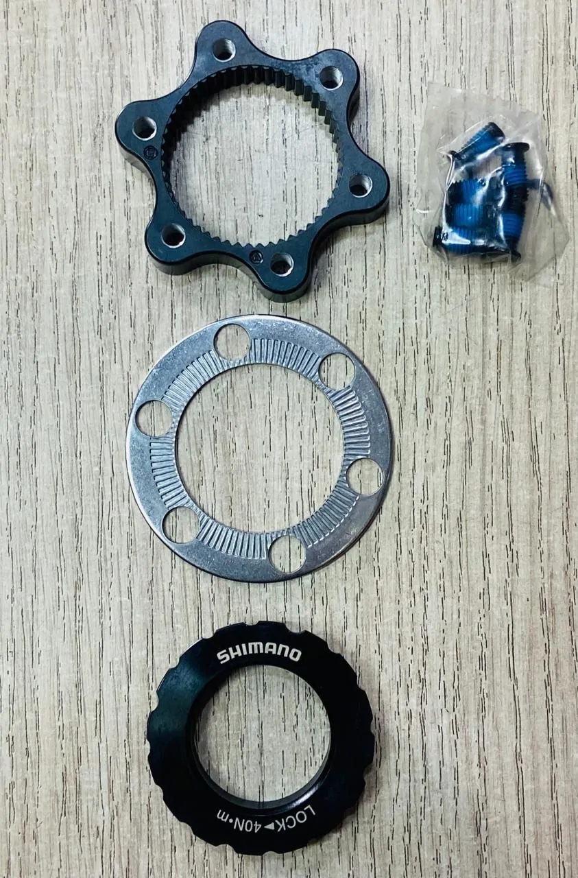 ADAPTADOR ROTOR 6 TORNILLOS A CENTER LOCK DISCO SHIMANO COLOR NEGRO (502640) - Imagen 7